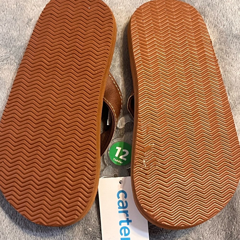 Carters toddler size 12 flip flops. New with tags